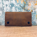 Leather-look tobacco pouch in tan brown with zip compartments and paper slot

