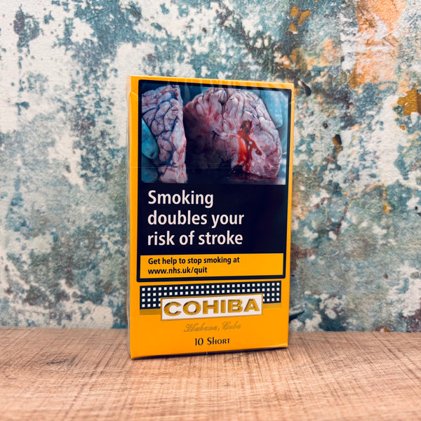 Cohiba Short Cigars package with health warning label on a textured surface